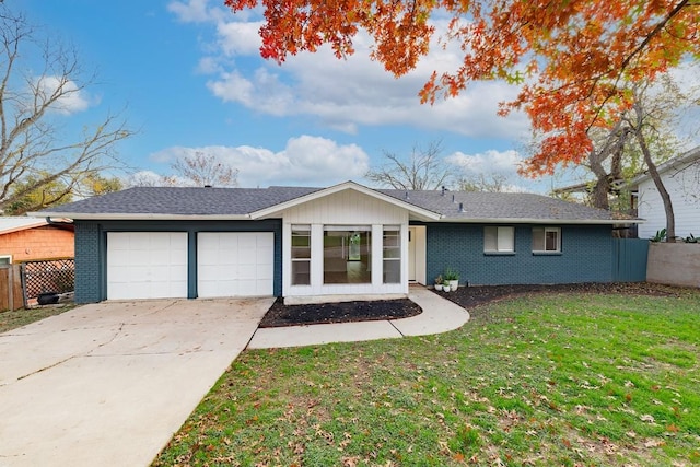 ranch-style house with a front yard and a garage