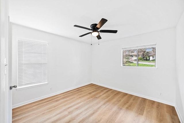 unfurnished room with light hardwood / wood-style floors and ceiling fan