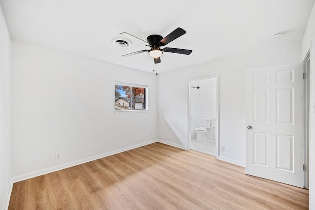 empty room featuring light hardwood / wood-style floors and ceiling fan