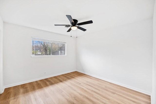 spare room with ceiling fan and light hardwood / wood-style floors