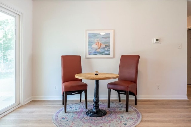 5201 Periwinkle Path, Austin, TX 78745 - living area featuring light wood finished floors and healthy amount of natural light