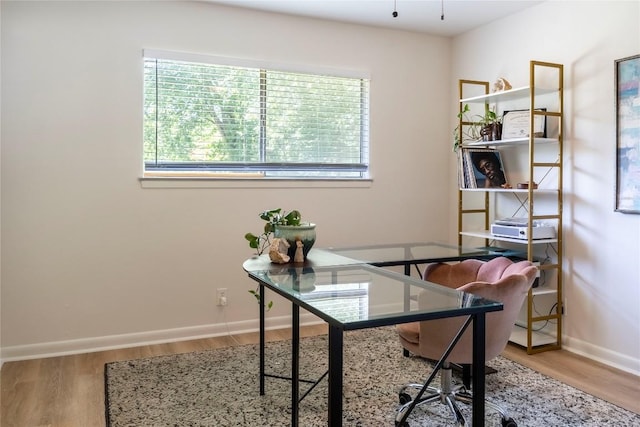 5201 Periwinkle Path, Austin, TX 78745 - office featuring wood finished floors and baseboards