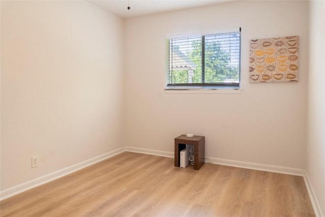 5201 Periwinkle Path, Austin, TX 78745 - unfurnished room featuring light wood-style floors and baseboards