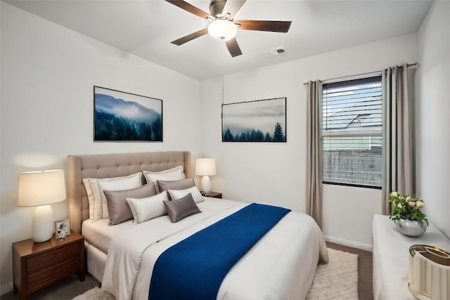 carpeted bedroom with ceiling fan