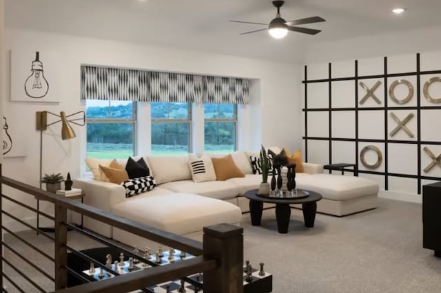 living room featuring carpet flooring and ceiling fan