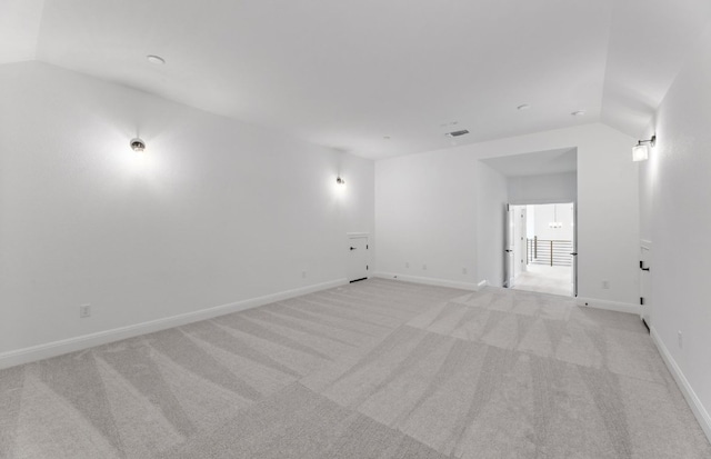 3353 Vestland Fjord St, Leander, TX 78641 - unfurnished room featuring light colored carpet, baseboards, and lofted ceiling