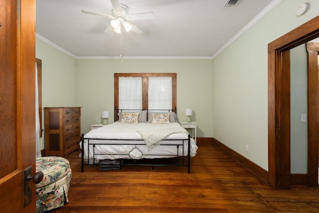 bedroom featuring ceiling fan, crown molding, and dark hardwood / wood-style floors