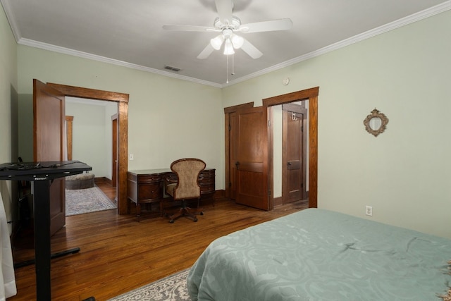 bedroom with wood-type flooring, ceiling fan, and crown molding