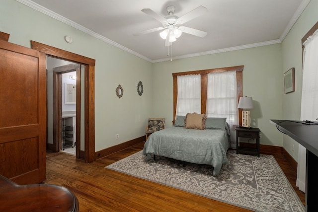 bedroom featuring dark hardwood / wood-style flooring, ceiling fan, and crown molding