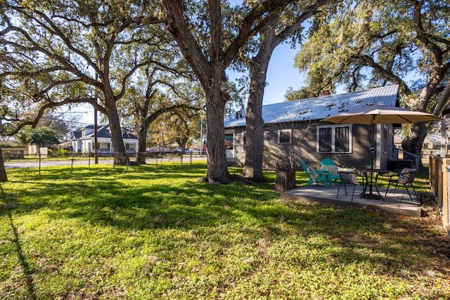 view of yard with a patio area