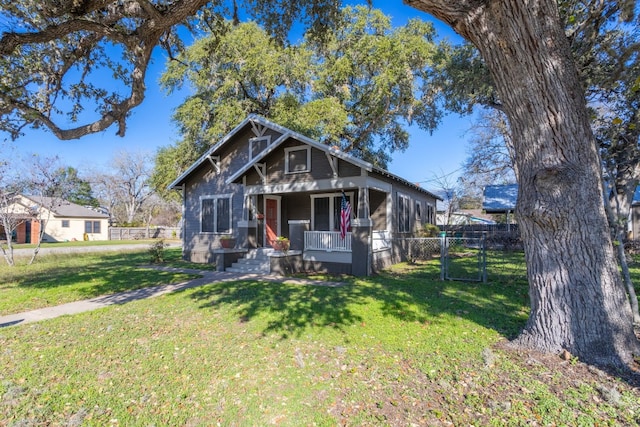 view of front of home featuring a porch and a front yard