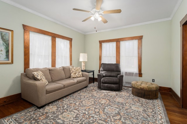 living room with hardwood / wood-style flooring, ceiling fan, and ornamental molding