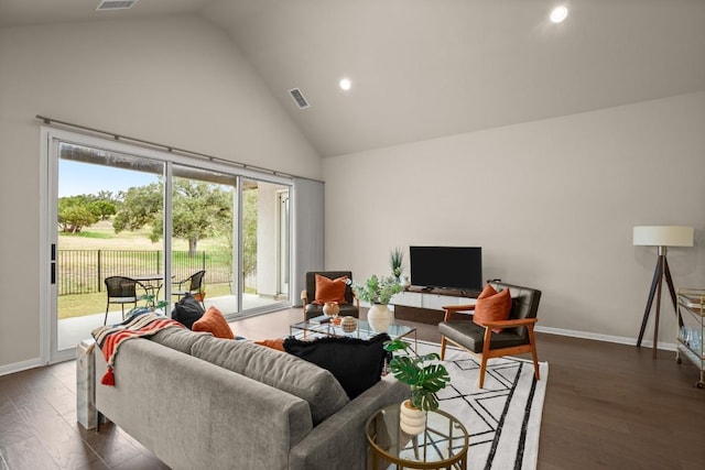 living room with dark hardwood / wood-style flooring and lofted ceiling