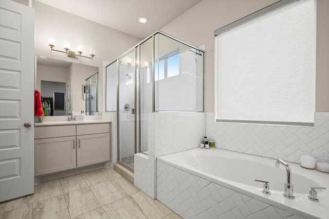 bathroom with vanity, tile patterned floors, and independent shower and bath