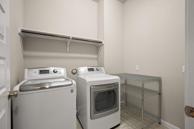 laundry area featuring washer and clothes dryer