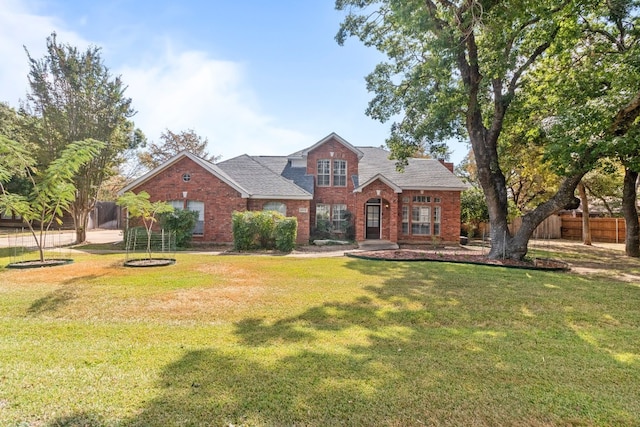 view of front facade with a front yard