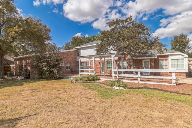 30102 Carmel Bay St, Georgetown, TX 78628 - view of front of house featuring brick siding and a front yard