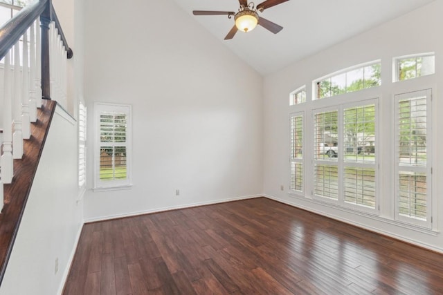 30102 Carmel Bay St, Georgetown, TX 78628 - unfurnished room featuring high vaulted ceiling, ceiling fan, stairway, and dark wood-style flooring