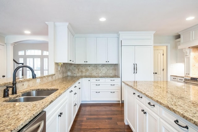 30102 Carmel Bay St, Georgetown, TX 78628 - kitchen featuring stainless steel appliances, white cabinets, recessed lighting, light stone countertops, and dark wood-type flooring