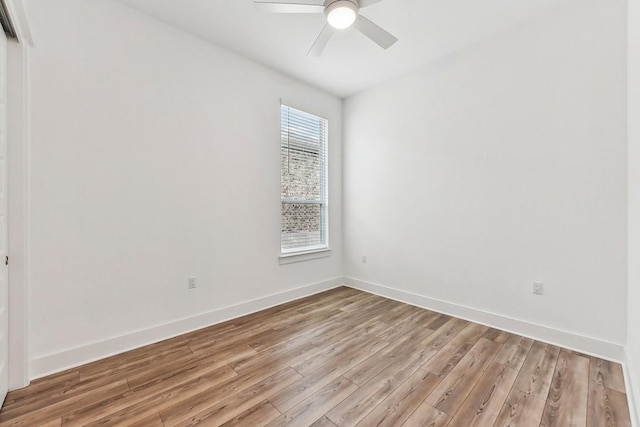 unfurnished room featuring light hardwood / wood-style floors and ceiling fan