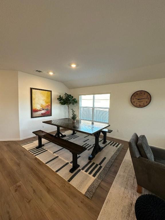 dining room with dark hardwood / wood-style floors