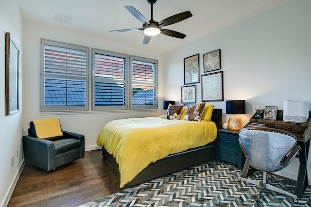 bedroom featuring ceiling fan and dark wood-type flooring