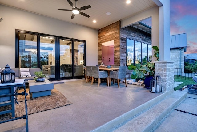 interior space featuring french doors and ceiling fan