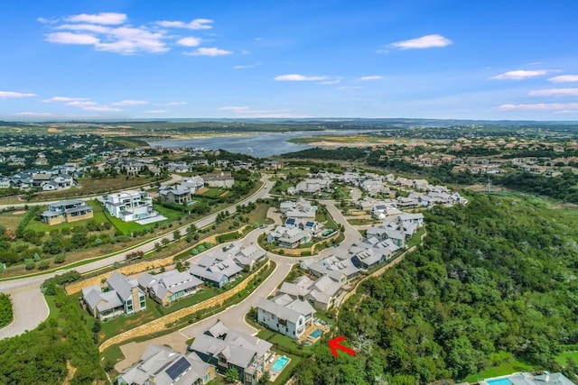 drone / aerial view with a water view