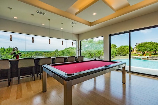 game room with a bar, light wood-style flooring, visible vents, and recessed lighting