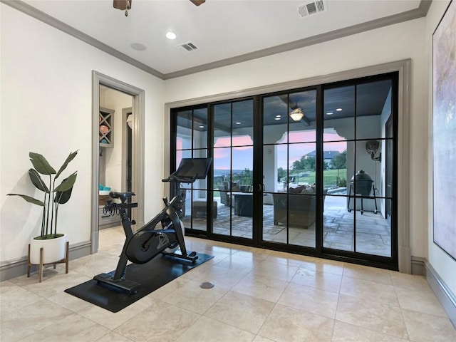 exercise area with ceiling fan, ornamental molding, and french doors