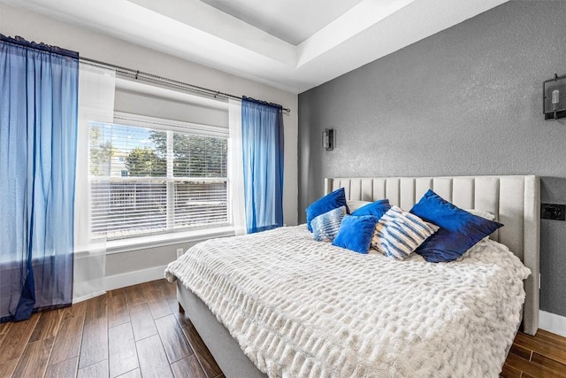 bedroom featuring a tray ceiling