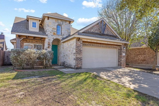 view of front facade featuring a front yard and a garage