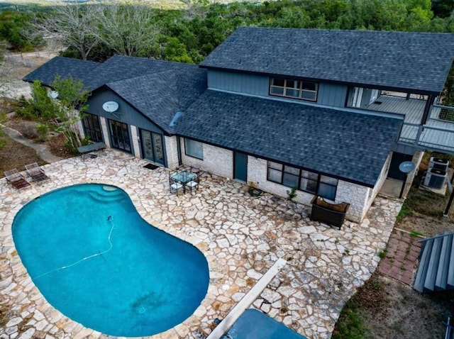 view of pool with a patio