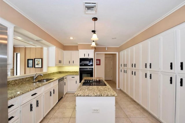 kitchen with light stone countertops, black appliances, a center island, white cabinetry, and hanging light fixtures