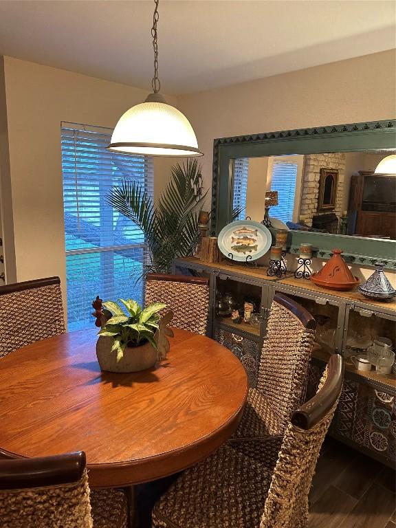 dining space featuring wood finished floors