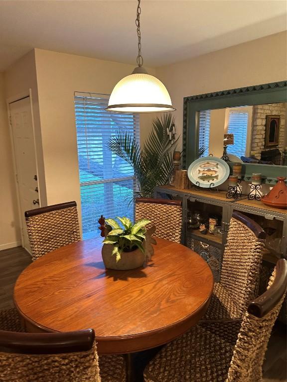 dining room with wood finished floors