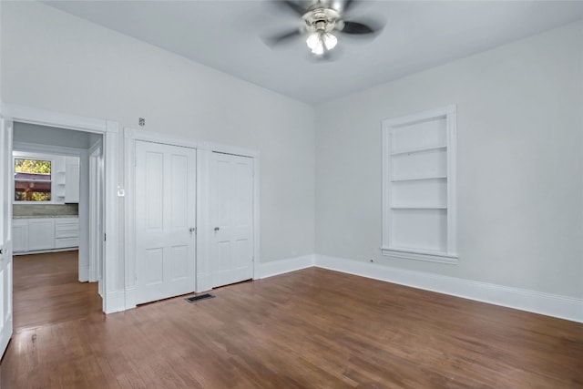 unfurnished bedroom with wood-type flooring and ceiling fan