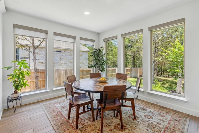 sunroom with plenty of natural light