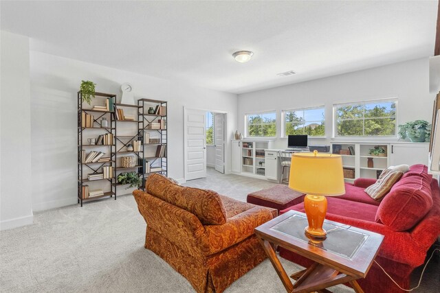 living room with light carpet