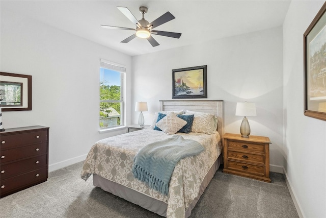 bedroom featuring light colored carpet and ceiling fan