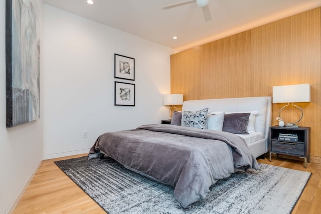 bedroom featuring ceiling fan and wood-type flooring