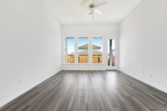 unfurnished room with dark wood-type flooring, recessed lighting, baseboards, and ceiling fan