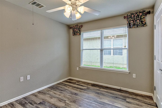 unfurnished room featuring ceiling fan and hardwood / wood-style flooring