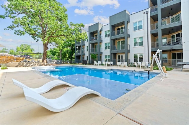 view of pool with a patio area