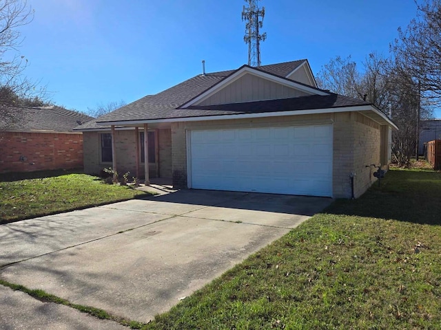 ranch-style house with a garage and a front lawn