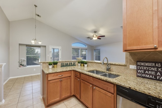 kitchen featuring kitchen peninsula, dishwasher, sink, and lofted ceiling