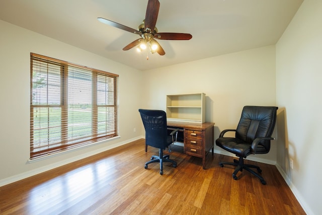 office with ceiling fan and wood-type flooring