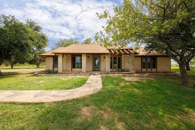 ranch-style house with a front yard