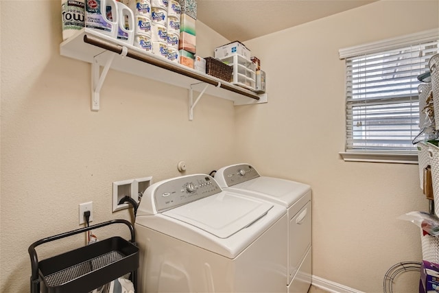 laundry room with independent washer and dryer