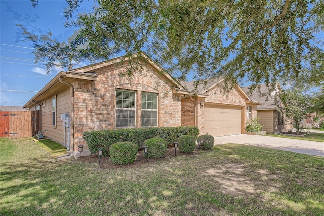 single story home with a front yard and a garage